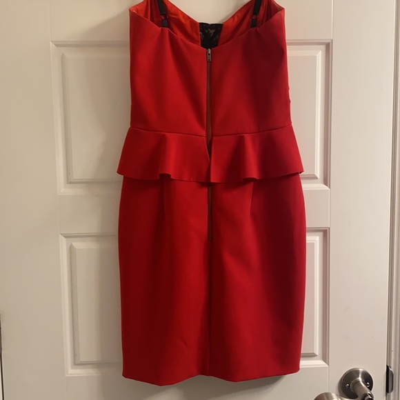 Parker, red peplum dress with black lace cutouts - Picture 3 of 3